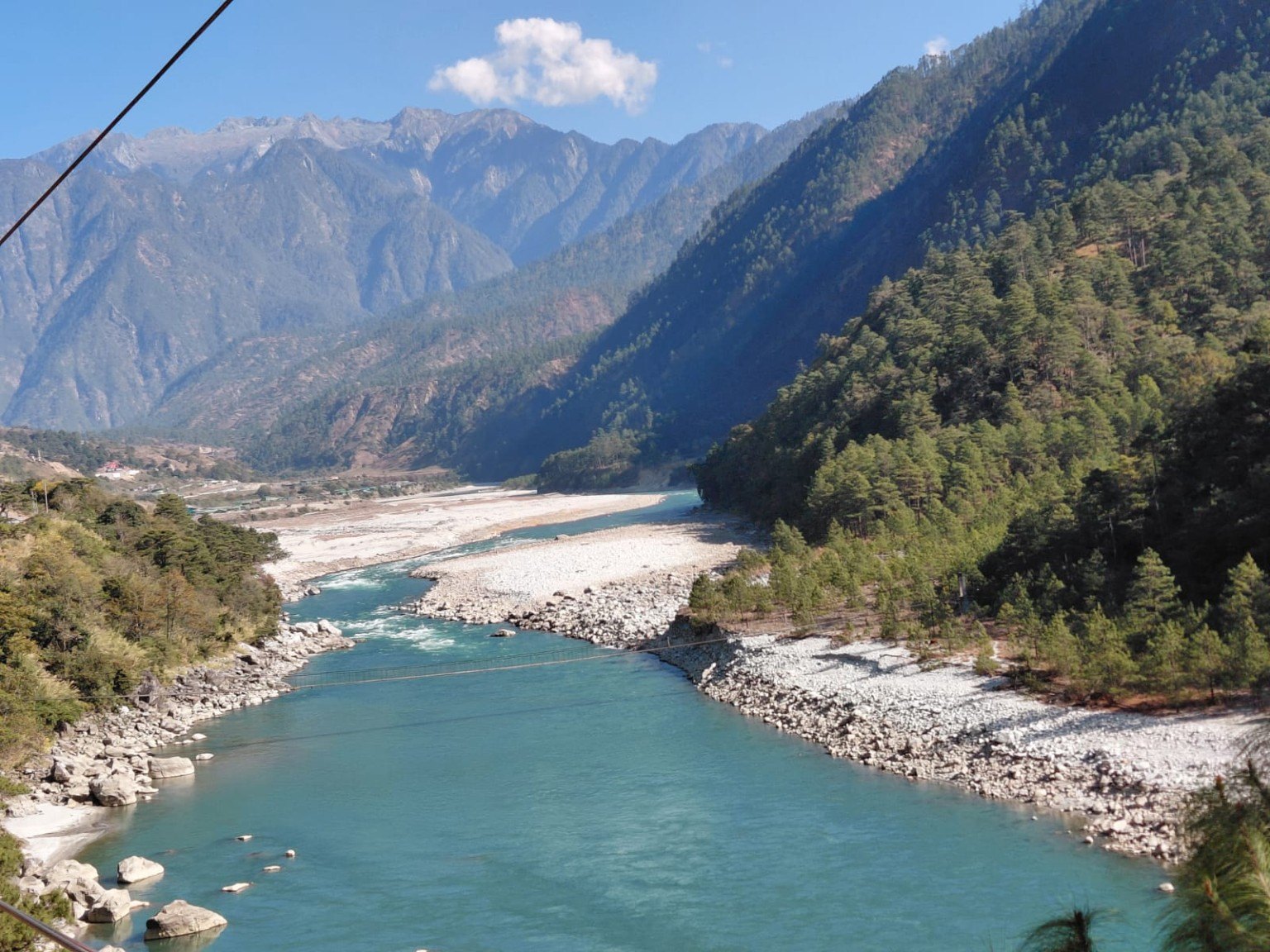 Blue river through a mountain valley