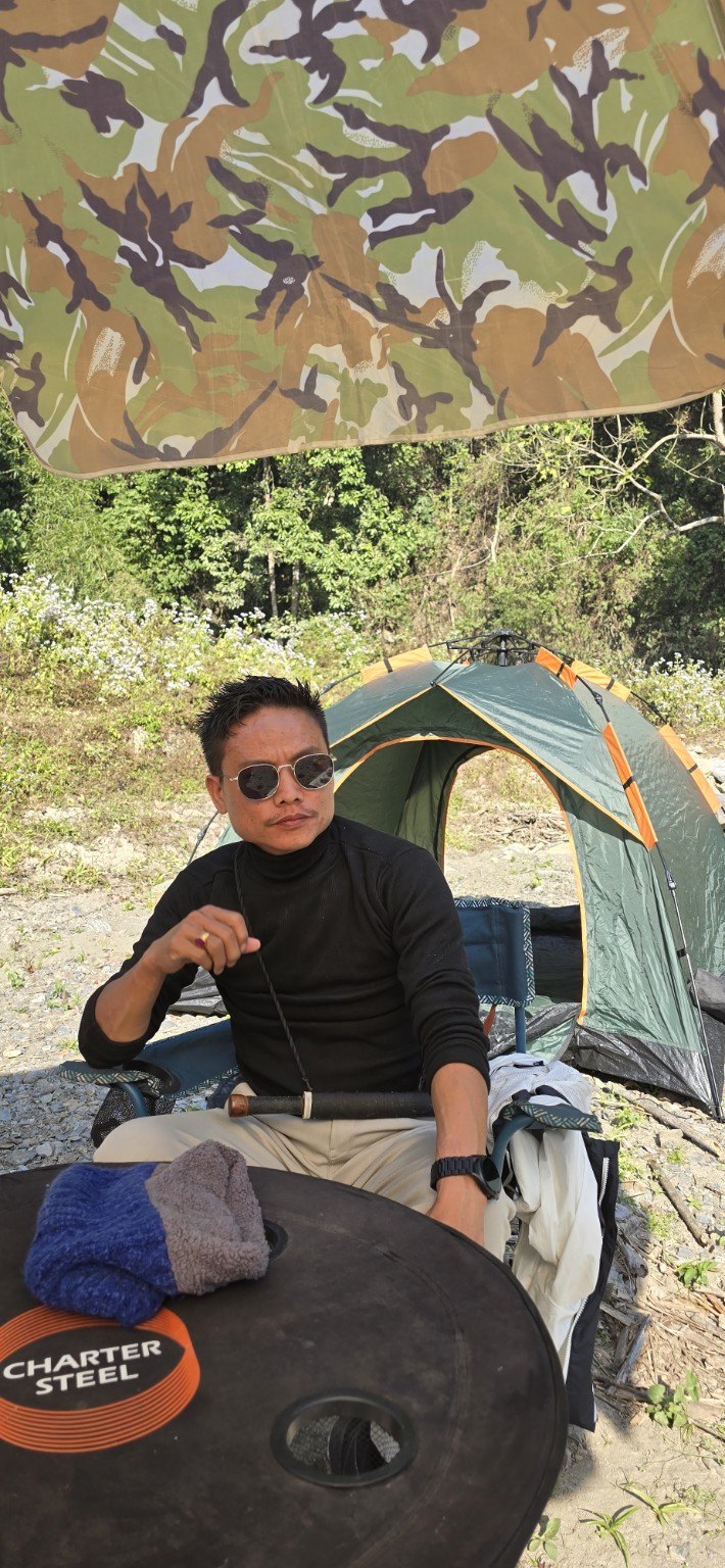 Nabam Mohan at a campsite
